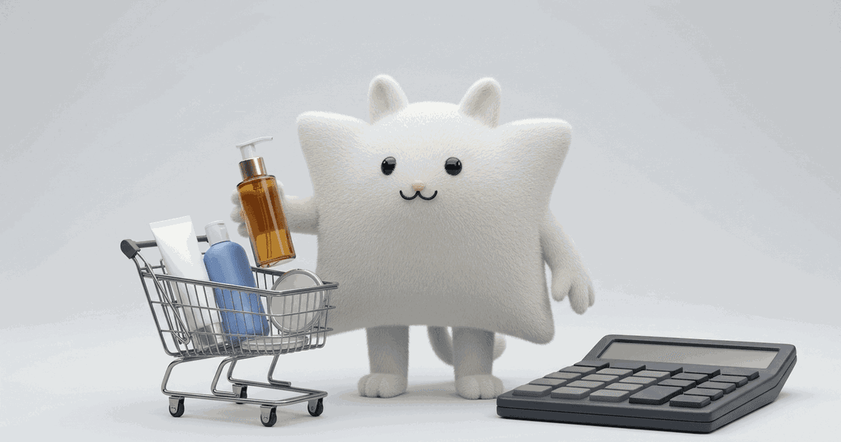 Mascotte Kayba en fourrure blanche devant un panier de produits de beauté et une calculatrice